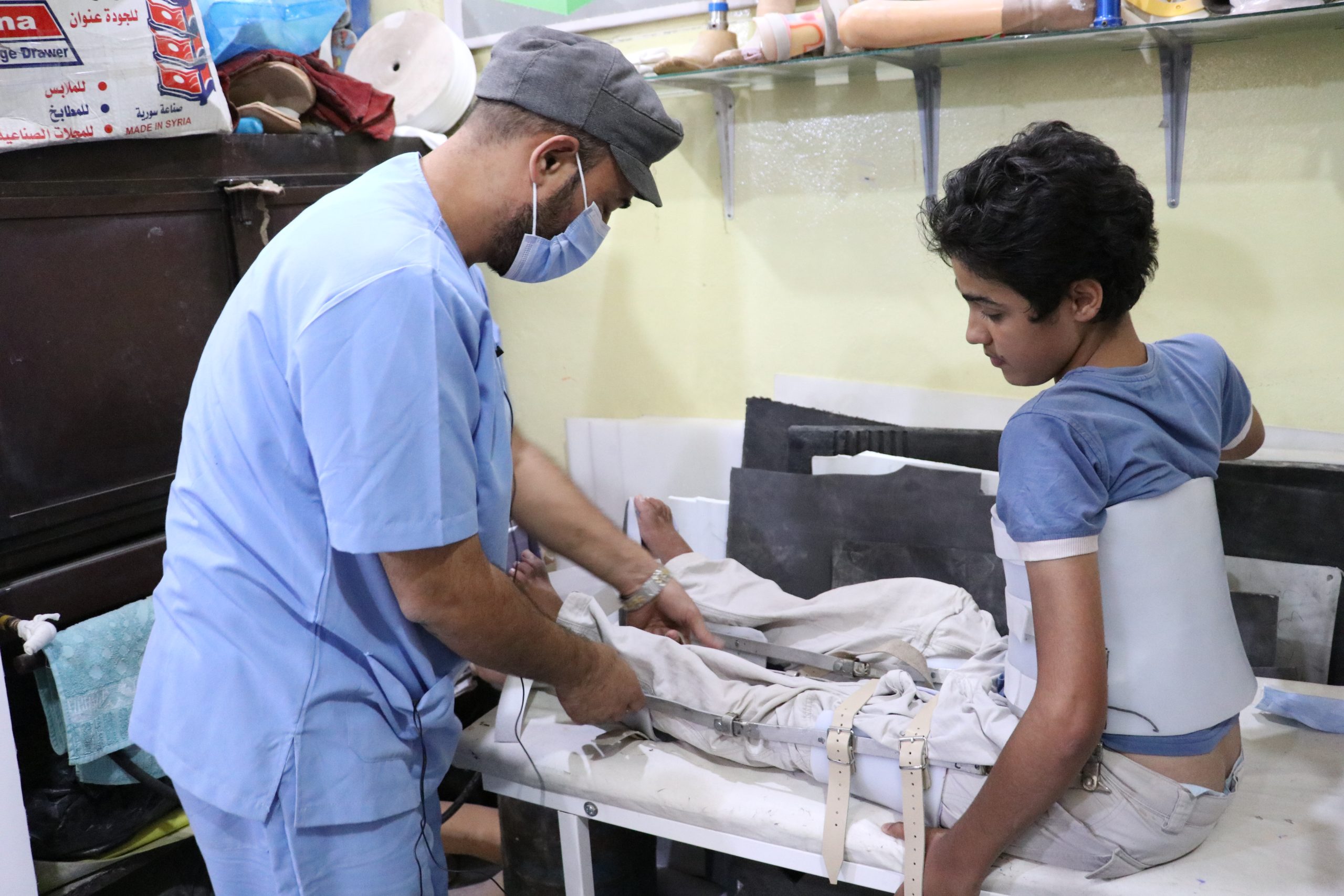 Electric wheelchair support for war victims